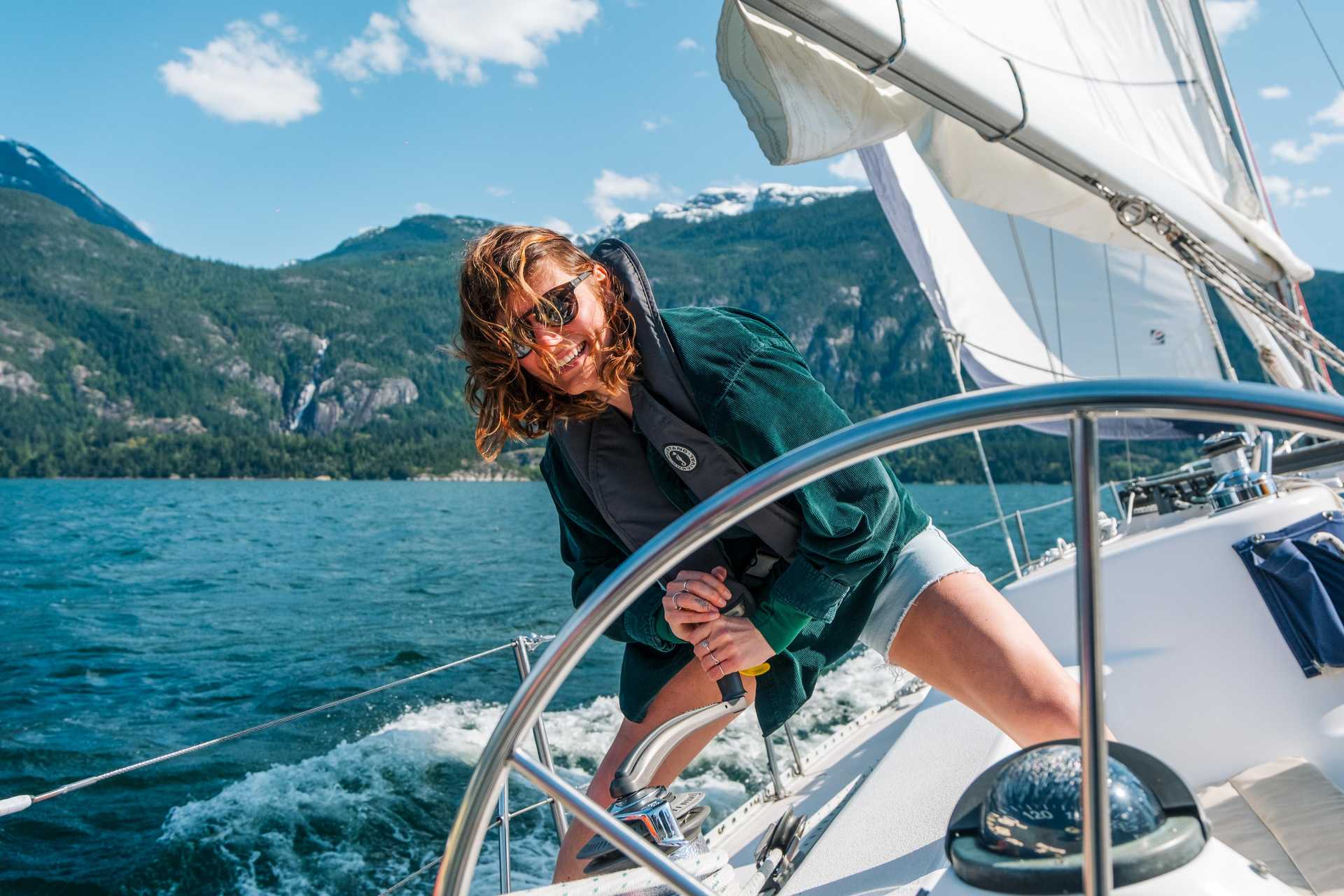 Family celebrating birthday on a sailboat